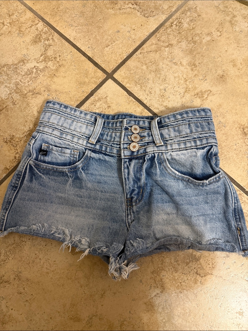 Women’s Light Blue Distressed Denim Shorts